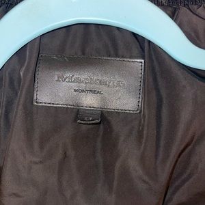 Knee length Mackage down coat with brown fox fur with waist belt.